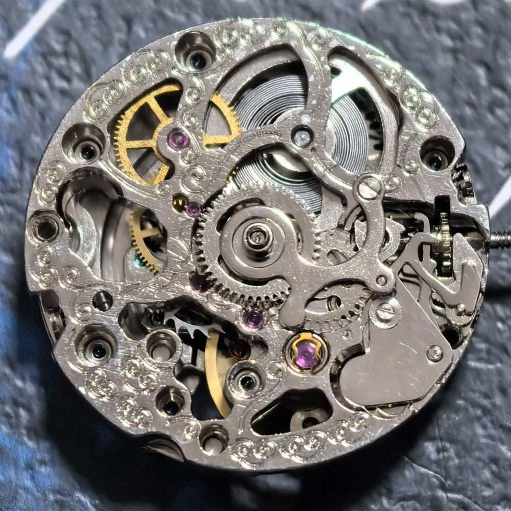 China Made Silver Hollow Mechanical Movement with Rose Golden Rotor Watch Part