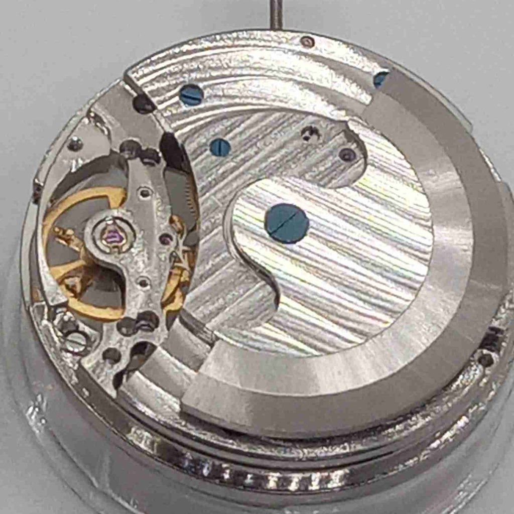 China Made Silver Hollow Mechanical Movement Hollow Part At 12 Big Flywheel