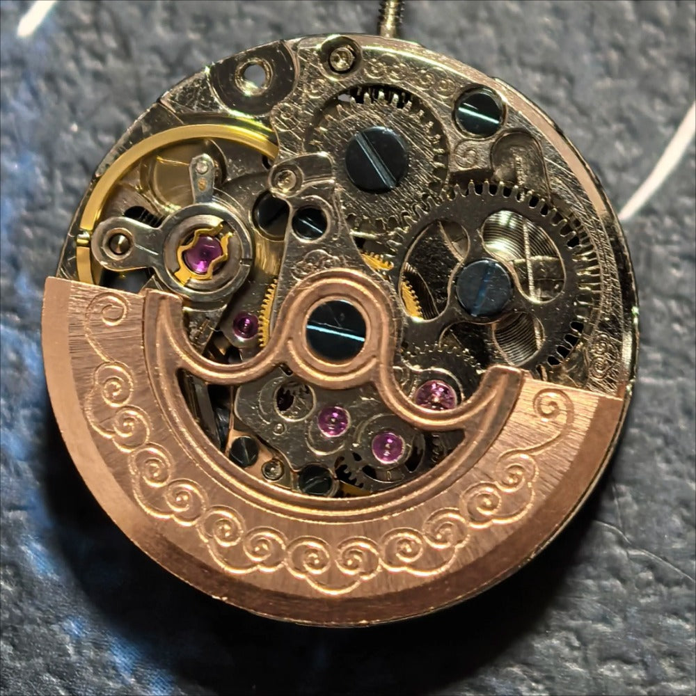 China Made Silver Hollow Mechanical Movement with Rose Golden Rotor Watch Part