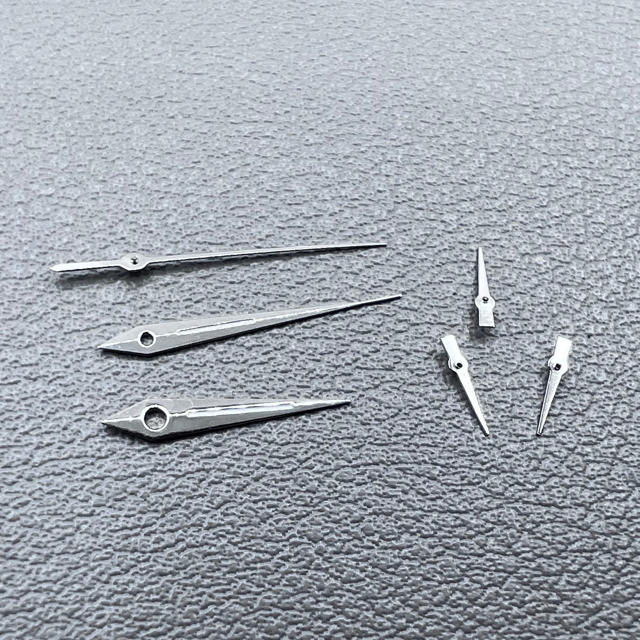 2 Sets Green Lume Arrow Shape Silver Trim Hands for VD53 VD54 VD57 Movement